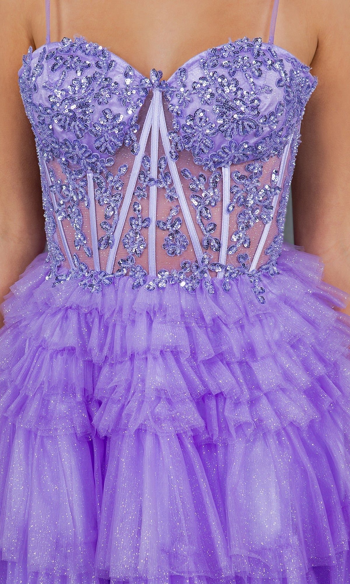 Close-up of Short Sweetheart Ruffled Homecoming Dress 5133J in purple, featuring a beaded semi-sheer corset bodice with floral accents and a layered ruffled tulle skirt.